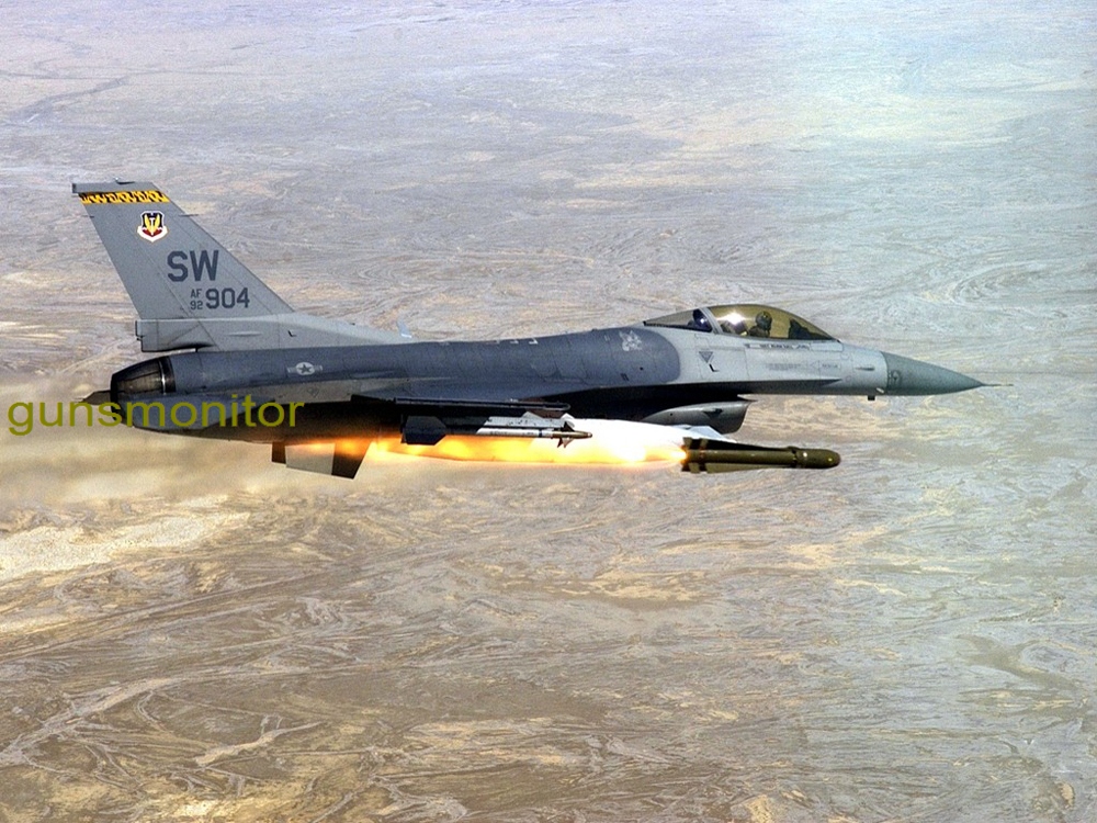 HILL AIR FORCE BASE, Utah -- Capt. Daniel Veal, an F-16CJ Falcon pilot with the 79th Fighter Squadron at Shaw Air Force Base, S.C., fires an AGM-65D Maverick missile at a target during an air-to-ground weapons system evaluation program named Combat Hammer. The mission took place over the Utah Test and Training Range. (U.S. Air Force photo by Tech. Sgt. Michael Ammons)